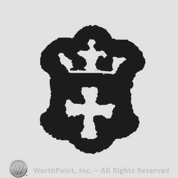 A shield with a crown over a cross.