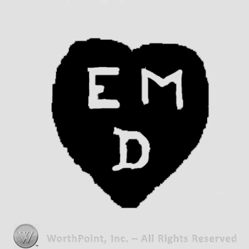 Letters EM over D, all in uppercase.