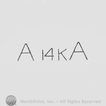 Two letters A and 14K written between.