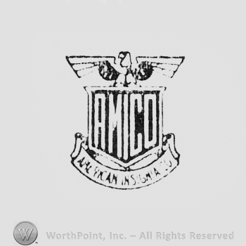 Shield with an eagle above and word AMICO written on it.