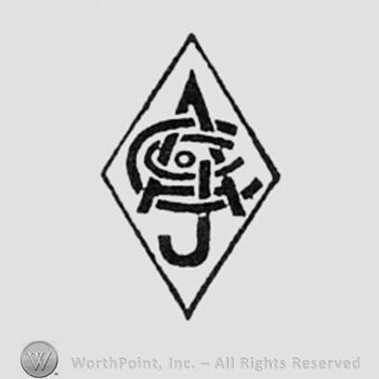 Monogram of letters AJC inside a diamond.