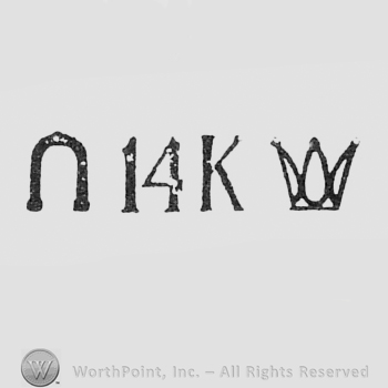 Letter N, 14k and a crown.