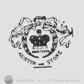 Crown inside a circle and words AUSTIN STONE written bellow.
