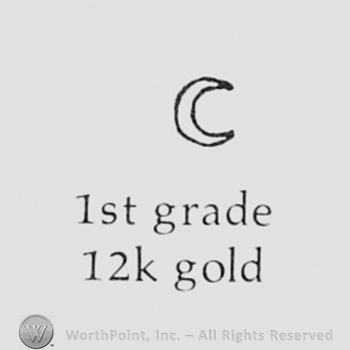 Crescent above text: 1ST GRADE 12K GOLD.