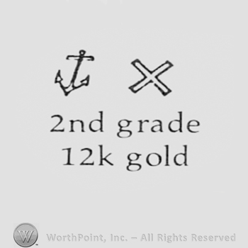 Anchor and an X above text: 2ND GRADE 12K GOLD.