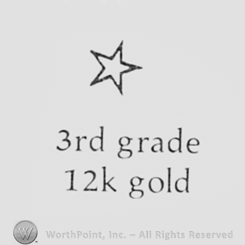 Star above text: 3RD GRADE 12K GOLD.