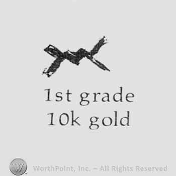 Monogram of letters M and W, and text: 1ST GRADE 10K GOLD.