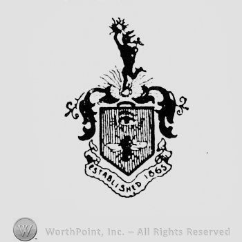 Shield with a fly and eye, and words ESTABLISHED 1865 written bellow.