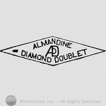 Words ALMANDINE DIAMOND DOUBLET AD, written inside a diamond.