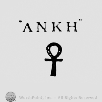 Letters ANKH written above a cross.