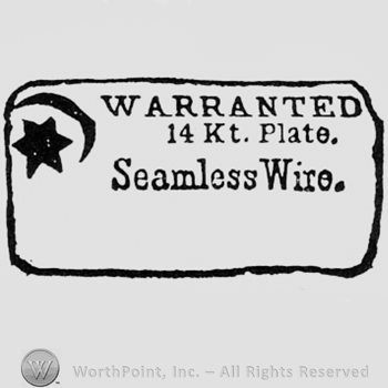 Words WARRANTED 14KT PLATE SEAMLESS WIRE; a crescent and a star, all inside a rectangle.