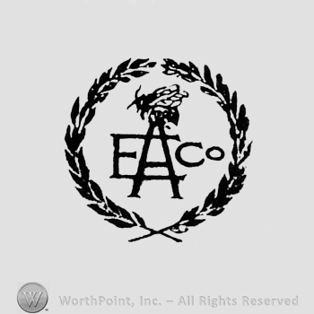 Monogram of letters E, A and Co, between two branches.