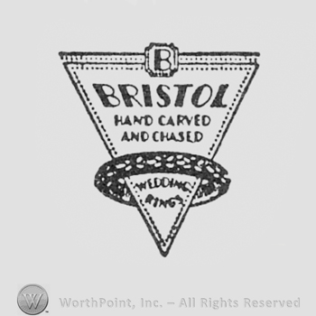 Triangle and a ring; text: BRISTOL HAND CARVED AND CHASED WEDDING RING written on the triangle.