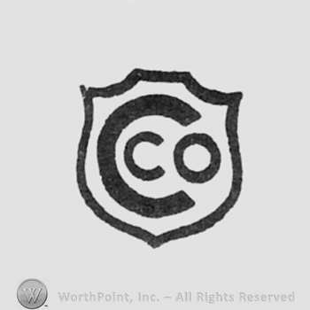 CO written inside letter C, all over a shield.