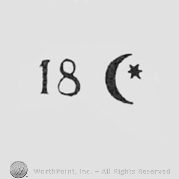 18 and a crescent with a little star on the right.