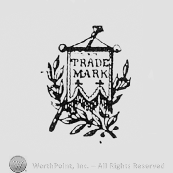 TRADE MARK written on a flag, next to a branch.