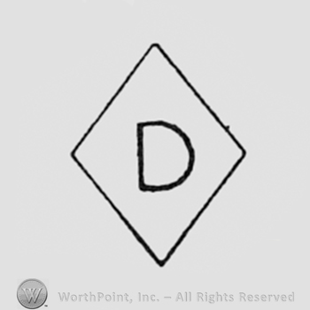 Letter D inside a diamond.