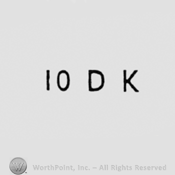 Number 10 and letters DK.