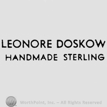 Words: LEONORE DOSKOW HANDMADE STERLING.