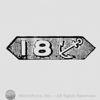 Number 18 and an anchor, inside a shape like a diamond.