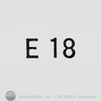 Letter E and number 18.