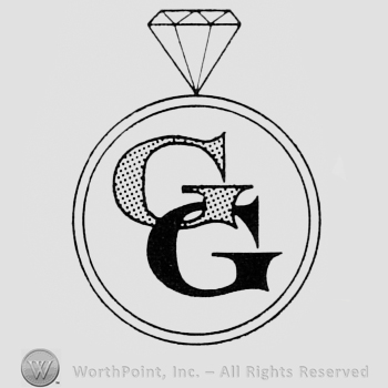 Double G inside a diamond ring.