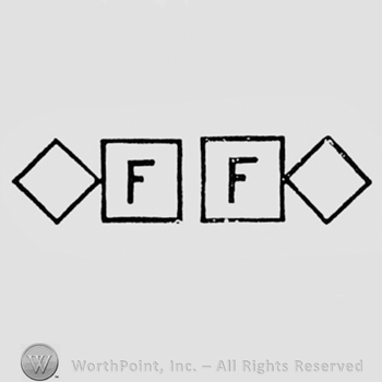Double F inside two squares between two diamonds.
