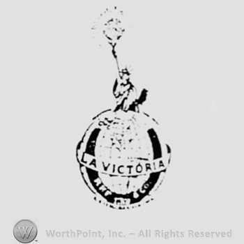 Globe and a horseshoe; word LA VICTORIA written over; statue of liberty above.