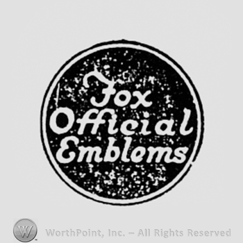 Words FOX OFFICIAL EMBLEMS written inside a dark circle.