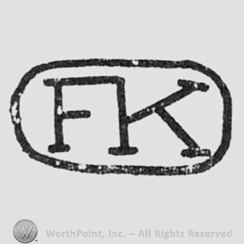 Monogram of letters F and K, inside an oval.