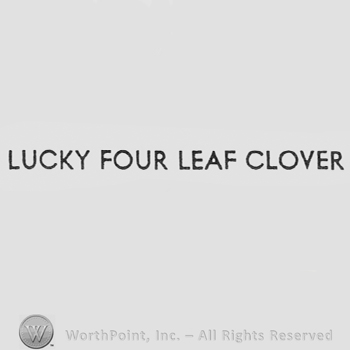 Words LUCKY FOUR LEAF CLOVER.