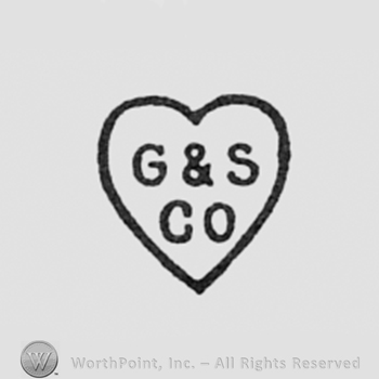 Letters  G & S CO inside a heart.
