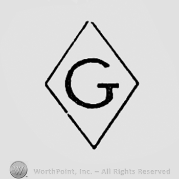 Letter G inside a diamond.