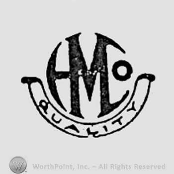 Monogram of letters H,M,Co and word QUALITY written bellow.