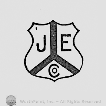 Letters J, E and Co, written on a shield.