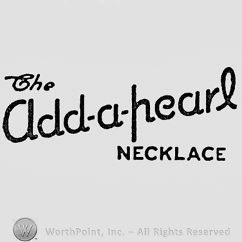 Words THE ADD-A-PEARL NECKLACE.