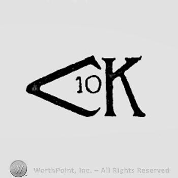 Pincers, number 10 and letter K.