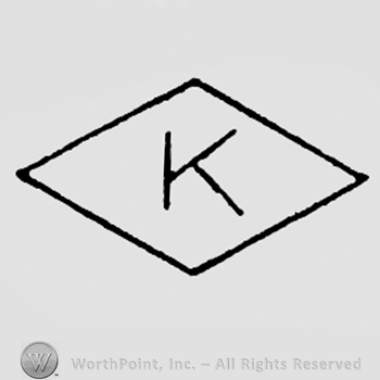 Letter K inside a diamond.