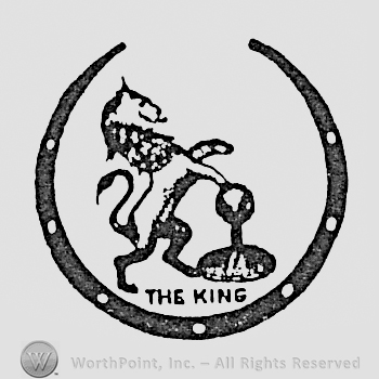 Lion with a globe and word THE KING, all inside a horseshoe.