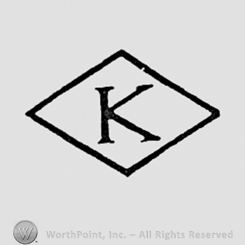 Letter K inside a diamond.