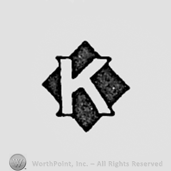 Letter K and a dark diamond behind.