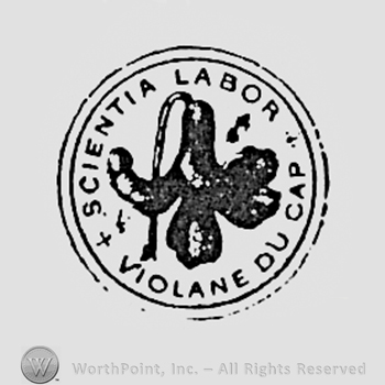 Flower and words SCIENTIA LABOR VIOLANE DU CAP, inside a circle.