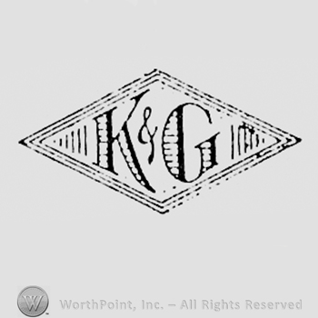 Letters K&G inside a diamond.