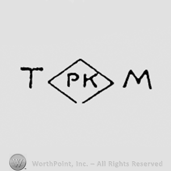 Letters P and K inside a diamond, between letters T and M.