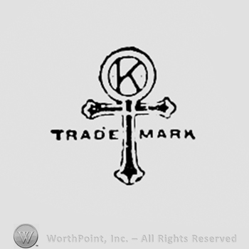 Letter K inside a circle, above a cross; TRADE MARK written bellow.