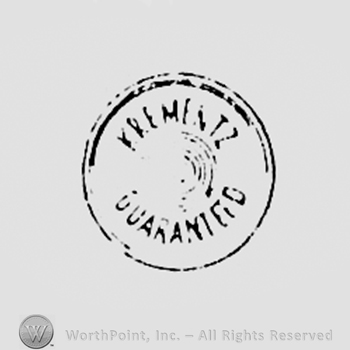 Plate with text KREMENTZ GUARANTEED.