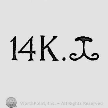 Number 14 and letter k next to a shape like an umbrella.