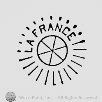 Word LA FRANCE above a circle with lines like a sun.