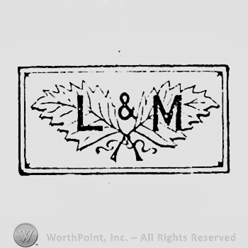 Letters L & M, two leaves behind, all inside a rectangle.