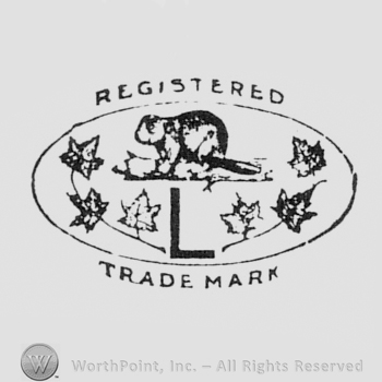 Leaves, beaver and letter l, all inside an oval; REGISTERED TRADE MARK written above and bellow.